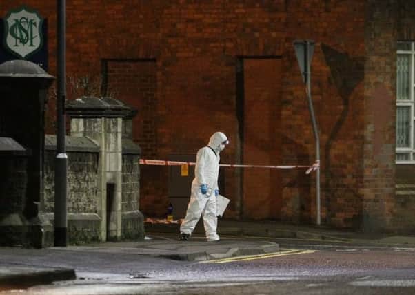 Police investigators at the scene of the stabbing incident in Coleraine. Pic by Steven McAuley/McAuley Multimedia