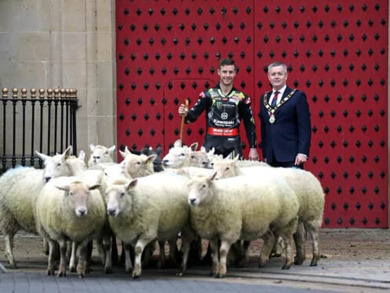 World Superbike champion Jonathan Rea received the Honorary Freedom of the Borough of Antrim and Newtownabbey on Tuesday. As a freeman of the Borough, in olden times Rea's special privileges would permit him to herd sheep in the streets, which he duly did in Antrim! Rea is pictured at the Barbican Gate with Mayor Paul Michael.