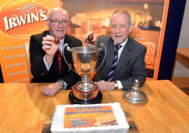Stephen Elliott and  Brian Irwin make the draw for the Nutty Krust Floodlit Cup 2019