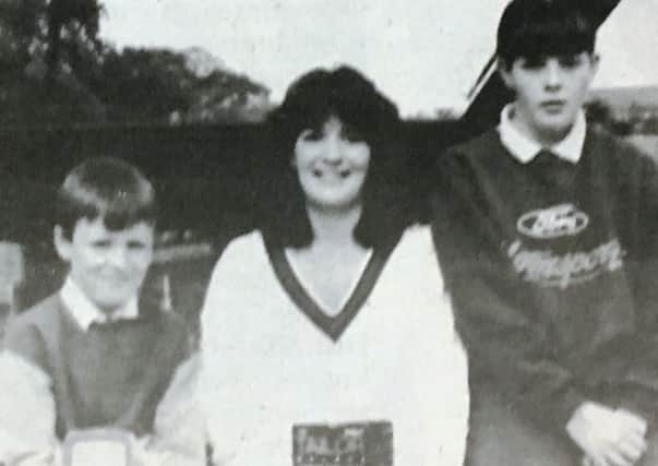 Graham Wilson, Michelle Wilson and Christine McClelland at the Dromore Central Primary School car boot sale in 1995.