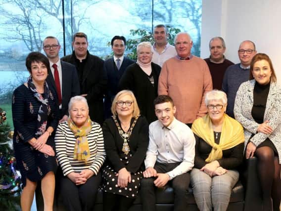 Eunan McGlinchey with friends and family members at a civic reception hosted in his honour by the Mayor of Causeway Coast and Glens Borough Council Councillor Brenda Chivers.
