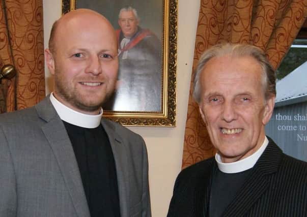 Rev Ken Elliott (right) with his successor Rev Darryl Abernethy