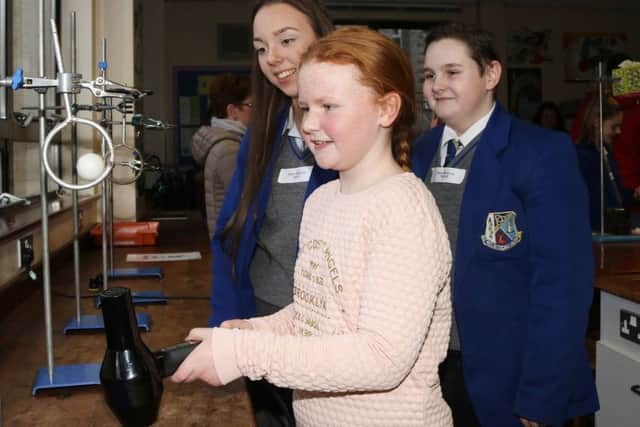 A prospective pupil attempting one of the open day challenges.