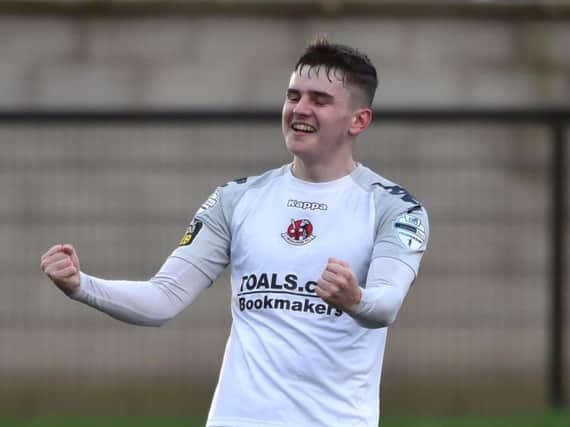 Crusaders Ronan Hale celebrates scoring his first goal for the club, at Institute.