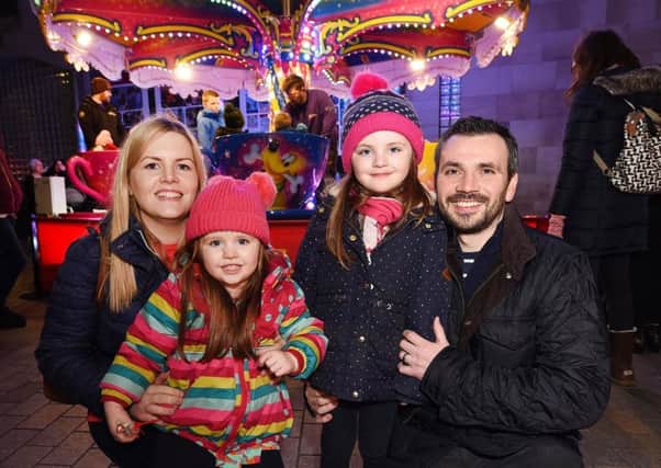 Isla and Betty Macartney with parents Andrew and Claire at the Lisburn City Centre Light Festival.
