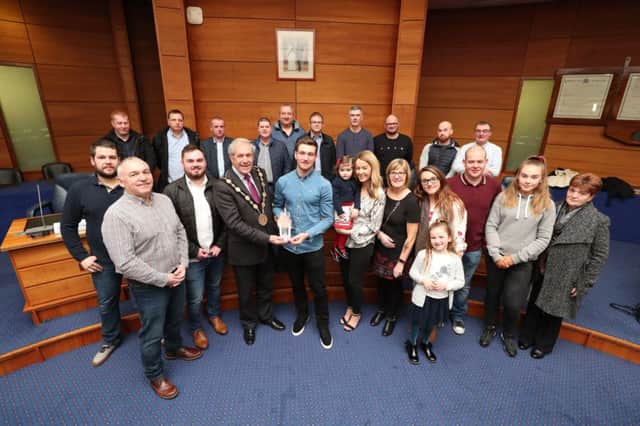 The Mayor of Lisburn & Castlereagh City Council, Councillor Uel Mackin welcomes Richard Bird's Motocross team, family and friends.