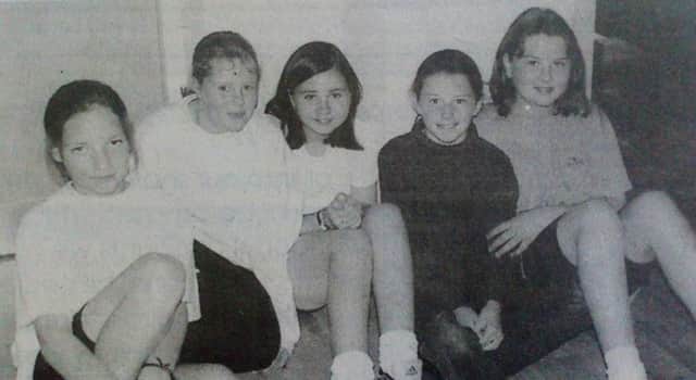 Christine Letham, Jenny Johnston, Karen Gilchrist, Nicola Curran and Caroline Carmichael relax at the Summer Scheme in Ballyearl. 1997.
