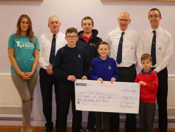 First Ballyeaston BB presenting a cheque to Cancer Focus NI.
