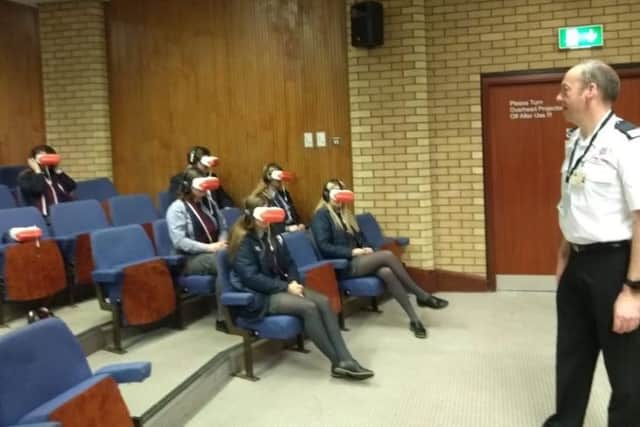 Year 13 pupils are given a demonstration on road safety by VR.