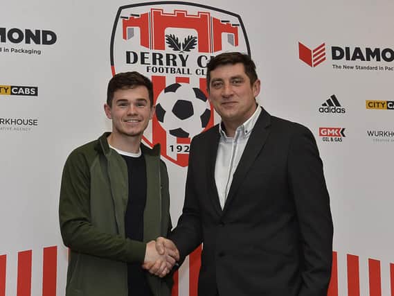 Derry City boss, Declan Devine pictured with Michael McCrudden who has signed ab 18 month pre-contract with the club.