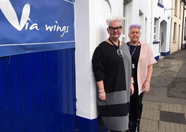 Via Wings founder Gail Redmond (left) and assistant manager Donna Harrison outside the charity's new base at Wellington House, Dromore.