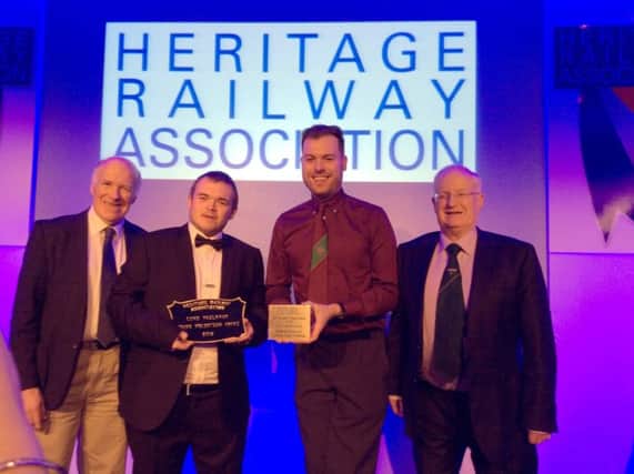 Heritage Railway Association Award winners Matthew Wilson (second
left) and Robert Gardiner (third left) celebrate their wins with Robin
Morton of the RPSI and Johnny Glendinning, chairman of HRA Ireland.