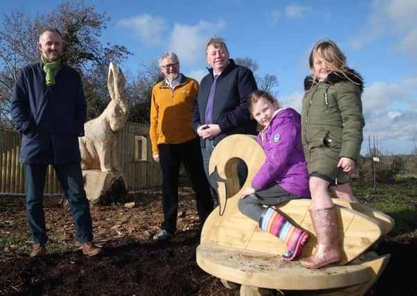 Pictured at the opening of the Sensory Garden in Moira with Alderman Paul Porter, Chairman of the Council's Leisure & Community Development Committee are: Richard Rogers, Alpha Programme; Owen Gawith, local councillor and local schoolchildren.