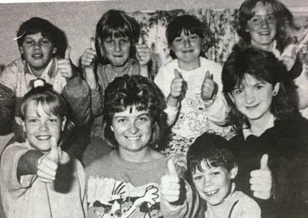 Youth leader Diane McClean with young people enjoying the Seagoe summer scheme in 1988.
