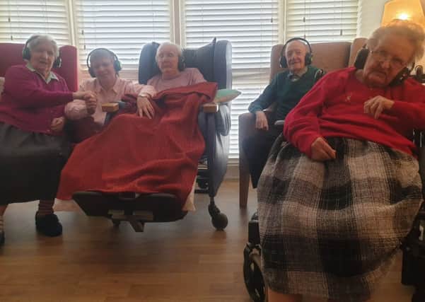 Wireless headsets have brought new joy into the lives of residents at Sandringham Care Home From left Nan Allen who loves to dance, Christina Wallace with her mum Grace who enjoys the music, Ronald Cooke (Cookie) who is a talented dancer and Beth Grafton who has rekindled her love of singing
