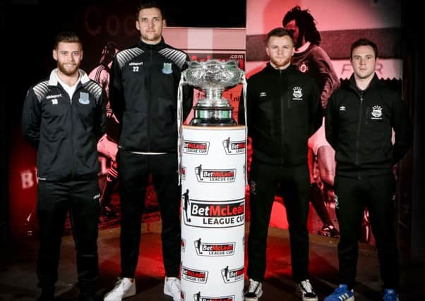 Ballymena players James Knowles and Adam Lecky along with Linfield's Niall Quinn and Jamie Mulgrew ahead of the 2019 BetMcLean League Cup final at The National Football Stadium at Windsor Park.
 Pic by PressEye Ltd.