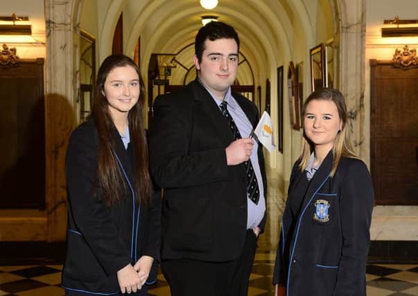 Orla Kane, Brendan McLaughlin and Anastasija Chelbuskina of St Louis Grammar School, Ballymena, who recently put their debating skills to good use when they represented Cyprus at this year's Mock Council of the European Union.