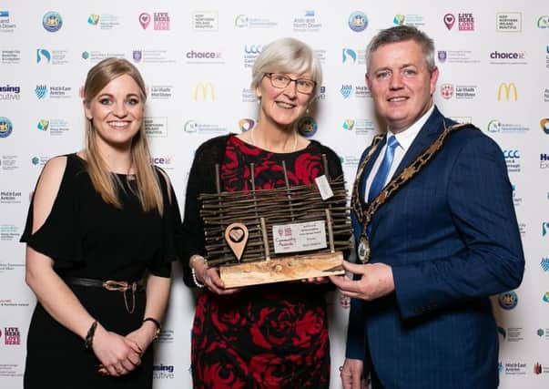 Live Here Love Here manager Jodie McAneaney with Antrim and Newtownabbey Litter Heroes Award winner Rosie Watkins and Mayor of Antrim and Newtownabbey Borough Council Cllr Paul Michael.
