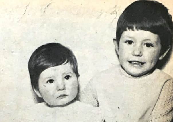 Nine month old Tracey with her six year old sister Lorraine, daughters of Mr and Mrs Robert Hanna, pictured in 1970.