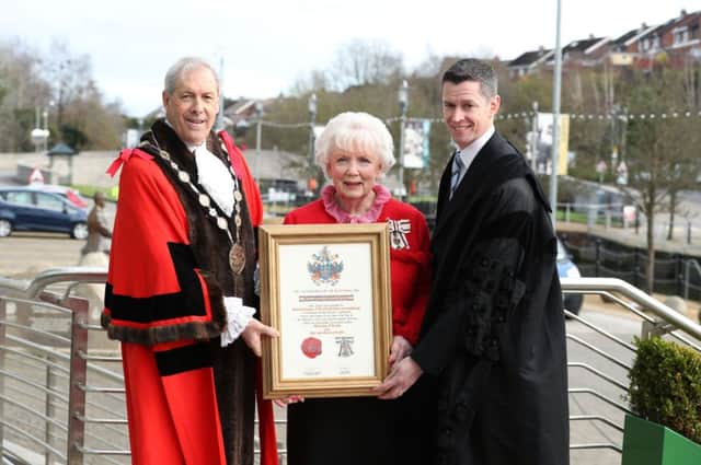 Mrs Joan Christie with Chief Executive David Burns and Mayor Uel Mackin during a tree planting ceremony at Lagan Valley Island after she received the Freedom of the City of Lisburn and Castlereagh.

  Photo by Kelvin Boyes / Press Eye