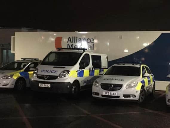 Police vehicles parked outside Craigavon A&E