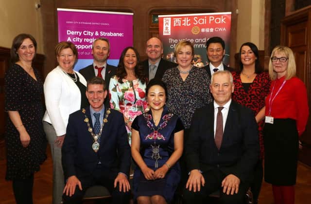 Pictured at the Chinese New Year celebrations hosted by the Mayor of Derry City and Strabane District, Councillor John Boyle, are back row from left Angela Askin DCSDC, Donna Blaney, the Executive Office, William CWA, Angela OKane, Mayoress, Kevin Curran, the Executive Office, Carol Stewart DCSDC, Tommy Yeung, Sai Pak, Pauline ONeill DCSDC and Amanda Biega DCSDC.  In the Front Row are Mayor Boyle, Chinese Consul Madame Zhang, and Council Chief Executive John Kelpie.