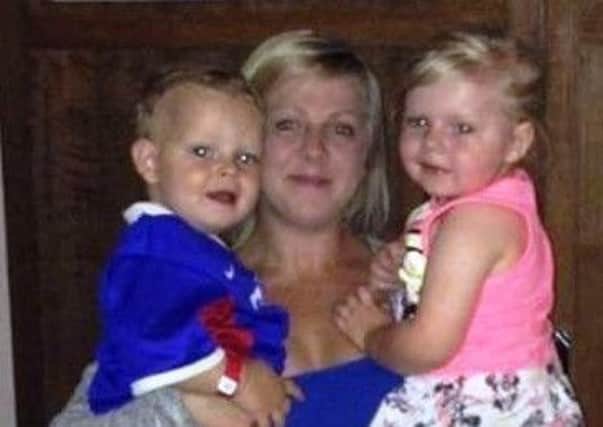 Ashlee Blair with two of her children.
