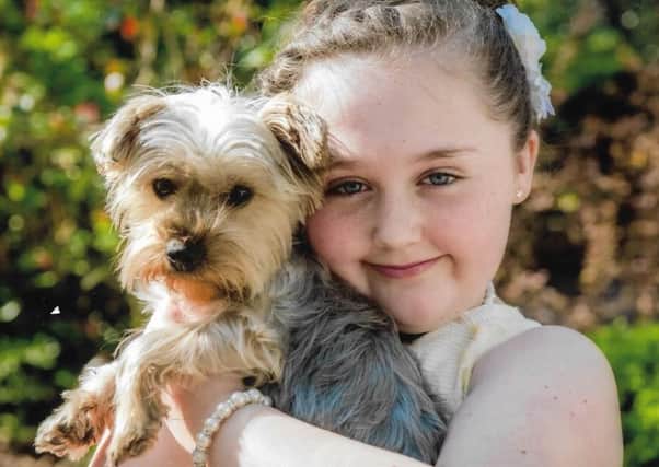Maddy-leigh with her dog Trixie