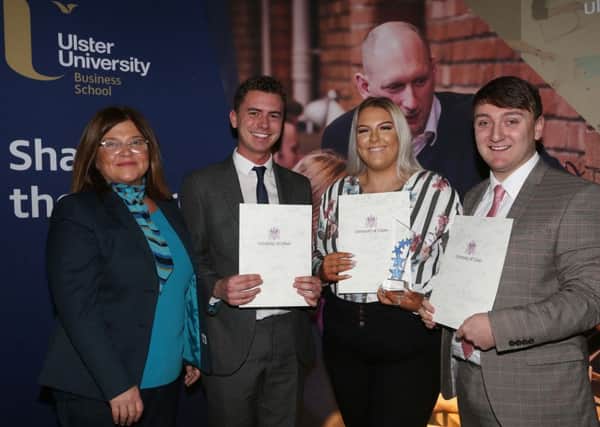 Catherine Hogg (centre) is presented with her award by Angela Doherty (left), Bank of Ireland along with joint winners Malcolm Lyttle and Stephen McPhillips.