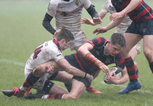 Ballymena's Matthew Corr in action with RSA's Benjie Boyd. Picture Matt Mackey/Press Eye.