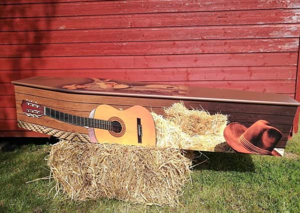 A country and western themed coffin