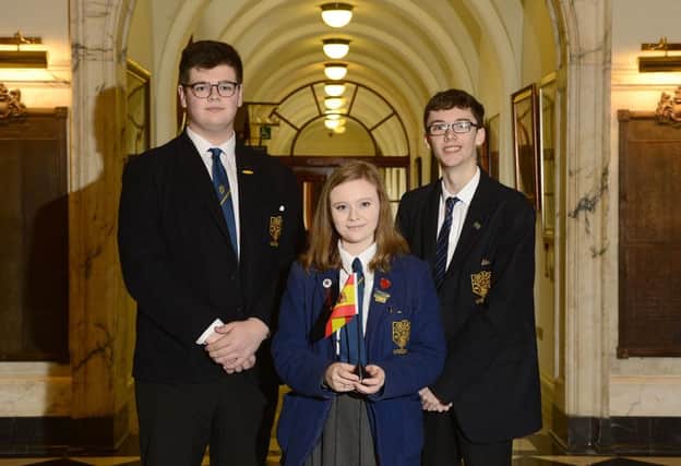 Reuben Bolton, Talula Reid and Jordan McClelland, Belfast High School, represented Spain at the Mock Council of the European Union.