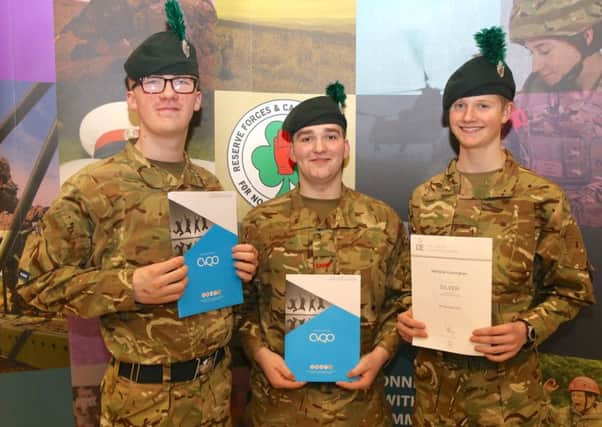Showing off the certificates which mark their latest achievements are, from left, 16-year-old Cadet Corporal Ben Dowey and 17-year-old Boaz Hughes who earned ILM Level 2 Awards and 16-year-old Cadet Lance Corporal Nathaniel Cunningham who achieved Silver in the Duke of Edinburgh Awards and who already has his eyes on Gold.