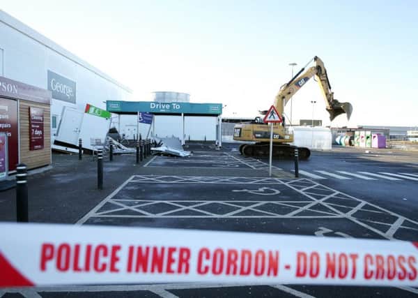 A digger was used to rip two ATMs from the wall of a building at the Asda supermarket in Antrim in the early hours of Friday, February 1. 

Photo by Matt Mackey, Press Eye