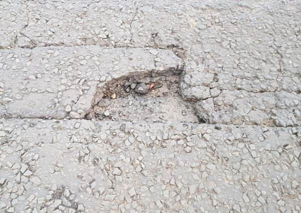 A pothole close to the junction with the Templepatrick Road.