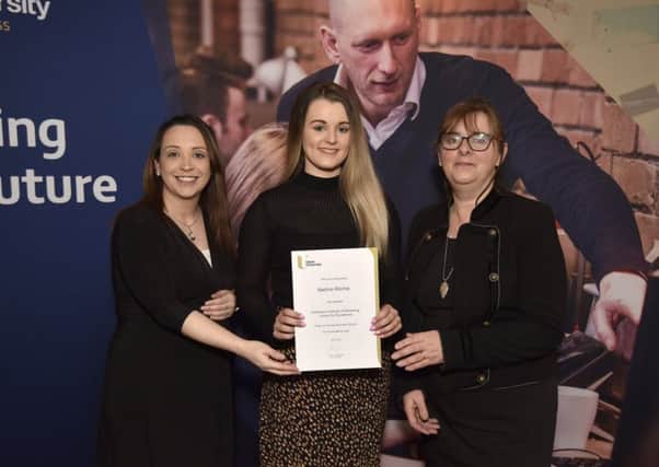 Nadine Ritchie, a former pupil of Cullybackey College, is presented with the Chartered Institute of Marketing Award for Excellence award by Maureen Wincott (right), Chartered Institute of Marketing and Dr Donna Towe, Ulster University Business School.
