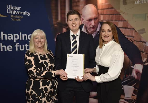 Sam Cherry is  presented with his awards by Charlotte Maguire (right), First Trust Bank and Dr Mary Boyd, associate head of Department of Management, Leadership and Marketing.