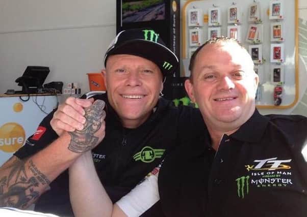 Phillip McCallen (right) sharing a smile with Prodigy star and bikes fan Keith Flint.