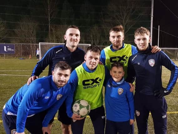Cameron pictured with Coleraine players Cormac Burke, Stephen O'Donnell, Ben Doherty, Dylan King and Jamie McGonigle