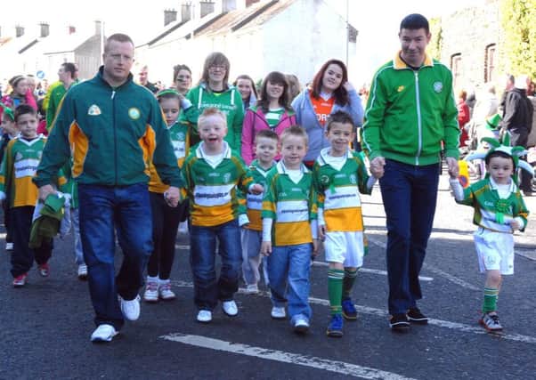 Enjoying their day at the St Patrick's Day parade a few years ago in Lurgan INLM1211-146gc