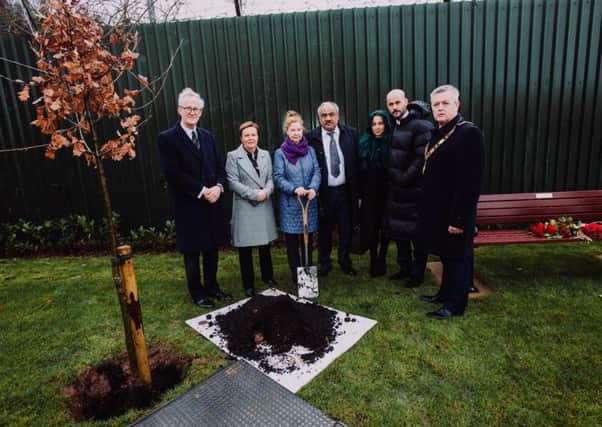 Mrs Azimkar and family are joined by Mr Mark Campbell, Randox; Chief Executive of Antrim and Newtownabbey, Mrs Dixon and Mayor of Antrim and Newtownabbey, Cllr Paul Michael at the private memorial service held earlier this morning where a commemorative tree was planted and bench was unveiled.