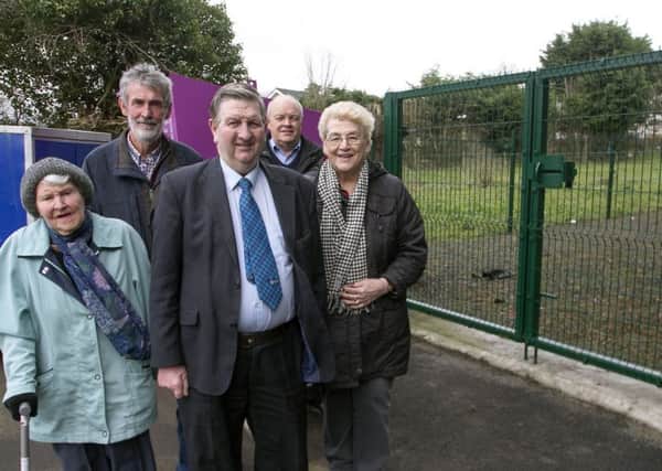 Cllr William McNeilly, pictured with Community Association members, Anne Cameron, Nora Neeson, Dessie Dixon and Stuart Knowles.