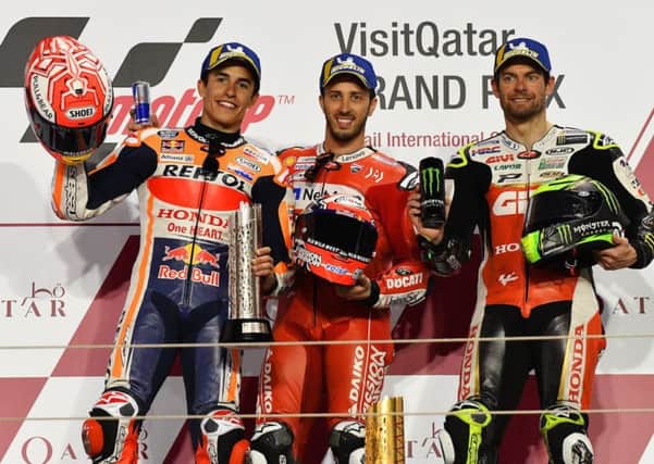 Qatar podium with L_R Marc Marquez, Andrea Dovizioso and British star Cal Crutchlow