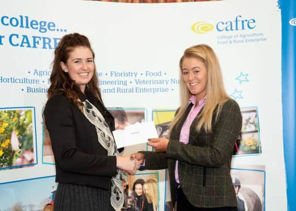 Megan Norton from Greenisland receives a £1,000 bursary from Alyssa ONeill, Horse Sport Ireland.