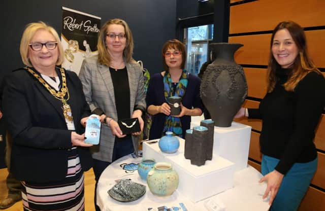 The Mayor of Causeway Coast and Glens Borough Council, Councillor Brenda Chivers pictured with Zoe Bratton, Tourism Product Development Officer, Causeway Coast and Glens Borough Council at the Crafters Showcase at Flowerfield Arts Centre with representatives from VM Jewellery and Elements Studio.