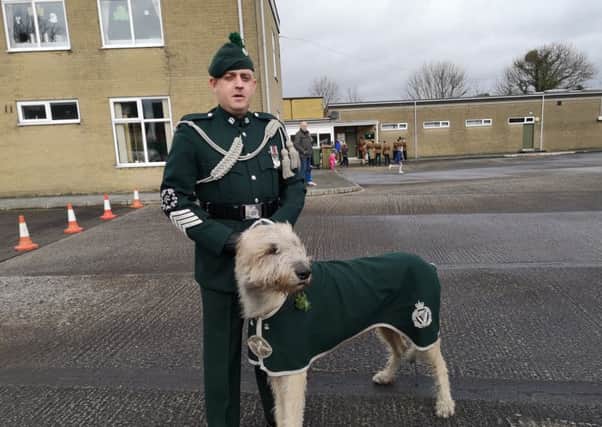 Royal Irish Regiment mascot Brian Boru X and his handler Wolfhound Major Moore.