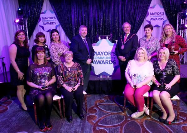 Pictured at the Mayor's Community Awards 2019 with the Mayor, Councillor Uel Mackin and Alderman Paul Porter, Chairman of the Council's Leisure & Community Development Committee are the Category Winners.