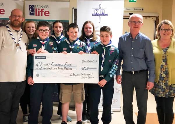 Members of the  Fifth Ballymena Scout Group travelled to the City Hospital to present the £508 they raised in a Charity Bag Pack in Tescos for The Northern Ireland Kidney Research Fund.