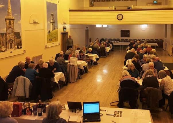 Local history enthusiasts taking part in the annual quiz at Carrickfergus Town Hall.