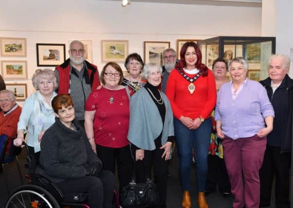 The Mayor of Mid and East Antrim, Cllr Lindsay Millar, with Carrickfergus Art Club members.